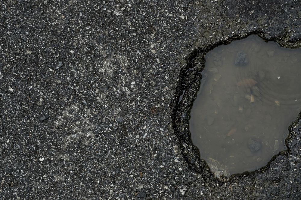 The Safety Hazards Posed by Pot Holes on Roads